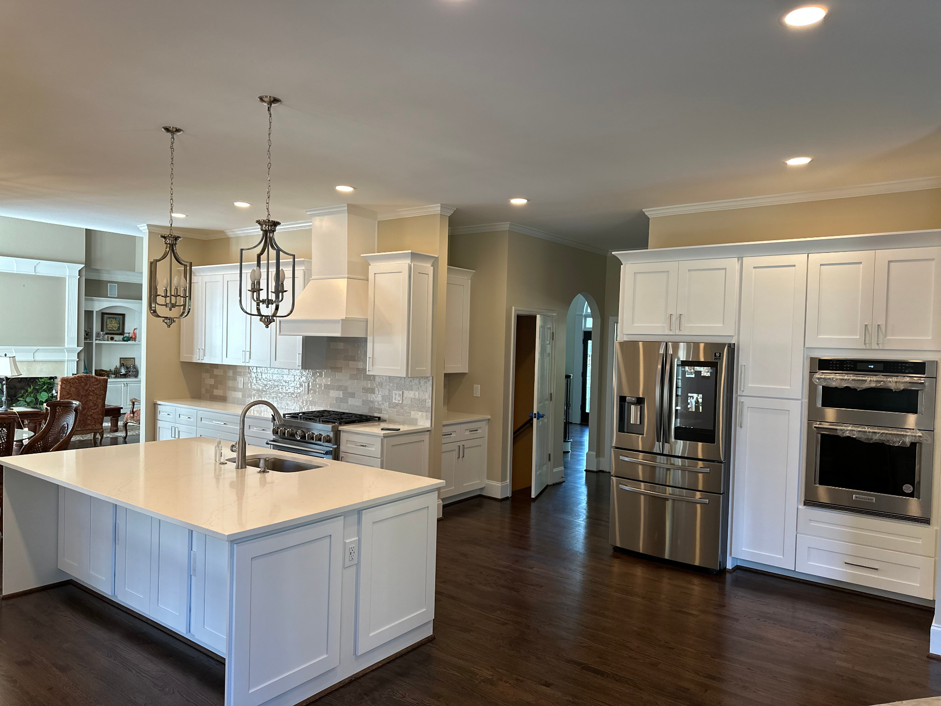 Bright white kitchen remodel with large island
